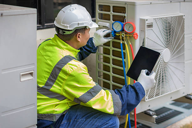 Professional Air Conditioning Repair technician working in Bassett, WI